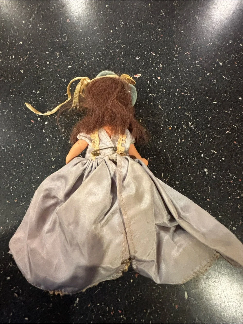 Vintage NaPorcelain Doll in Pale blue and Gold Gown labeled “Storybook doll